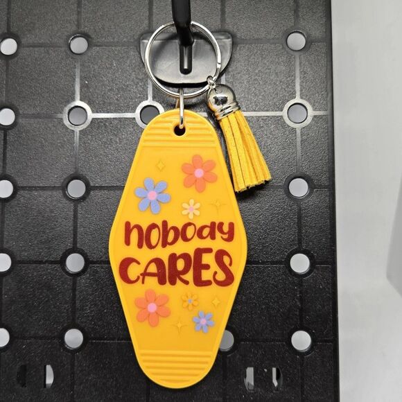 Nostalgic Classic Motel Keychain Nobody Cares - Picture 1 of 1